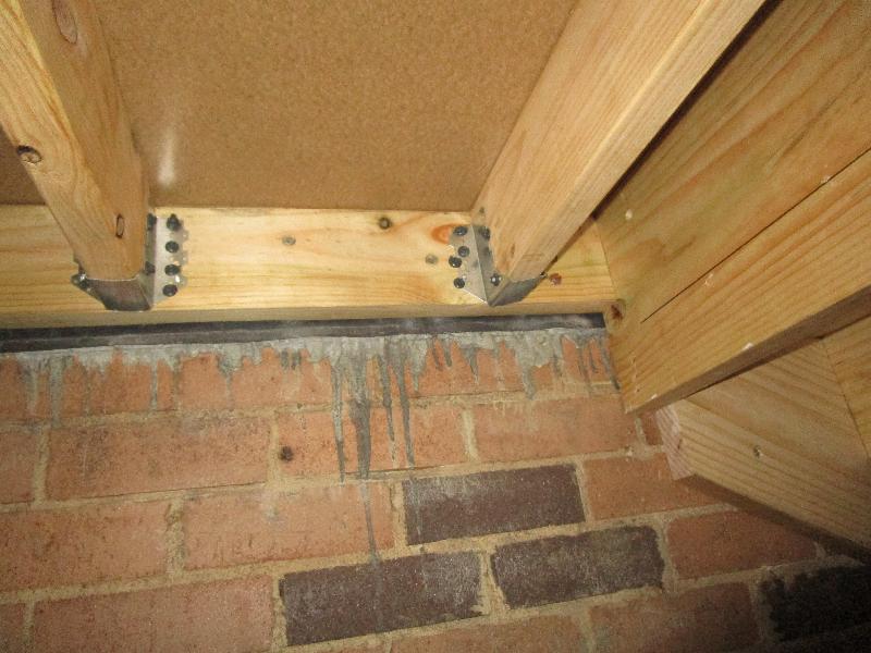 Subfloor timber in contact with the brickwork. No termite shields